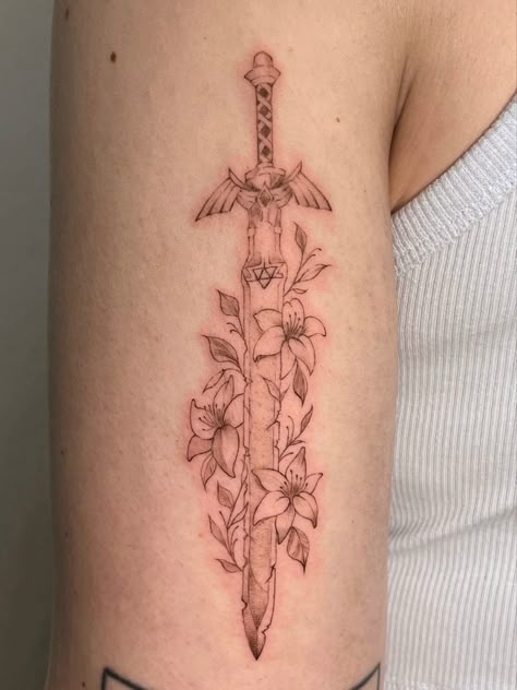 zelda swird tattoo Minimalist Zelda Tattoo, Light Dragon Tattoo Zelda, Legend Of Zelda Dragon Tattoo, Subtle Zelda Tattoo, Loz Tattoo Ideas, Legend Of Zelda Botw Tattoo, Zelda Tatoos Ideas, Zelda Inspired Tattoo, Legends Of Zelda Tattoo