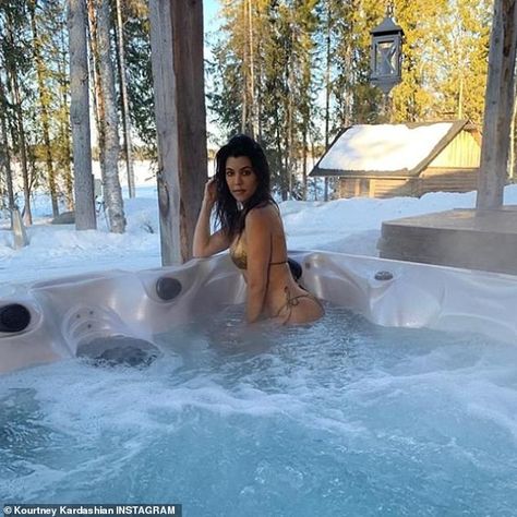 Kourtney Kardashian sizzles in gold bikini as she soaks in a hot tub in throwback Finland snap | Daily Mail Online Kourtney Kardashian Instagram, Photo Splash, Kendall Jenner Instagram, Metallic Swimsuit, Snow Photoshoot, Snow Pictures, Snow Trip, Victorias Secret Models, Hot Tub Outdoor