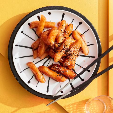 Fried tteokbokki (Korean rice cakes) recipe | Gourmet Traveller Fried Rice Cakes Korean, Fried Tteokbokki, Rice Cakes Recipe, Tteokbokki Recipe, Korean Rice Cakes, Maple Syrup Glaze, Recipe Korean, Korean Rice Cake, Rice Cake Recipes