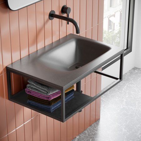 Lisse 24 Rectangle Concrete Wall-Mount Bathroom Sink in Dark Grey is a sophisticated combination of hand-poured concrete atop a sleek steel frame. Designed to complement any space, this selection is impactful while remaining highly functional. Constructed from stain and scratch resistant concrete, the Lisse will remain beautiful for many years. Porous Concrete, Dark Gray Bed, Concrete Material, Wall Mount Sinks, Wall Mount Sink, Concrete Materials, Concrete Sink, Hallway Bathroom, Wall Mounted Bathroom Sink