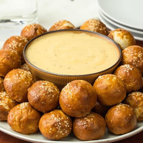 Pretzel Bites With Mustard Cheese Sauce Recipe by Tasty Video Game Party Food, Soft Pretzel Bites, Cheese Sauce Recipe, Soft Pretzel, Pretzel Dip, Dessert Party, Coarse Salt, Soft Pretzels, Snacks Für Party