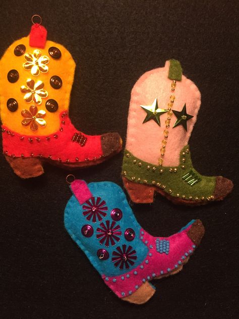 Felt Cowboy Boot ornaments Cowboy Boot Felt Ornament, Western Felt Ornaments, Felt Cowboy Boot Ornament, Cowboy Boot Ornaments, Winter Felt Crafts, Cowboy Boot Stocking, Western Ornaments Diy, Cowboy Boot Embroidery, Diy Cowboy Boots