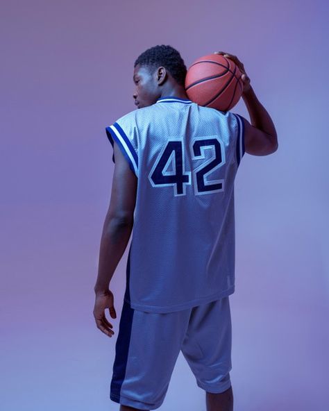 Basketball player poses with ball, back ... | Premium Photo #Freepik #photo #people #man #gym #basketball Basketball Poses For Pictures, Basketball Photoshoot Ideas, Basketball Editorial, Basketball Pose, Basketball App, Sports Jersey Outfit, Basketball Photoshoot, Kobe Jersey, Shooting Basketball