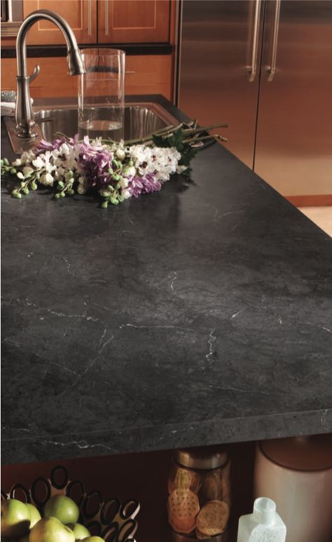 The Black Alicante HPL (High-Pressure Laminate) from Wilsonart’s Marble series featured on this countertop is a perfect subtle dark design for any kitchen or bath design🖤 #modernkitchen #hpl #wilsonart Catani Cabinets is proud to have Wilsonart as one of the suppliers of the high-quality materials we are dedicated to using in every Catani remodel. Learn more about how we revitalize kitchens and baths by checking out our YouTube channel below! 👇 Dekton Countertops Black, Dark Countertops Laminate, Dark Laminate Countertops With White Cabinets, Black Marble Laminate Countertops, Black Concrete Countertops White Cabinets, Black Alicante Laminate Countertops, Dark Corian Countertops, Black Laminate Countertops Kitchen, Dark Formica Countertops