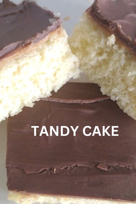 Tandy Cake is a classic dessert that’s been around for ages. It’s a chocolate-covered vanilla sponge cake with a layer of peanut butter in the middle. Yum! I have never met a person who doesn’t like tandy cake! They are so easy to make at home and a pan of tandy cake feeds a crowd. This recipe is perfect to take to a picnic or a potluck. Peanut Butter Tasty Cake Recipe, Tandy Cake Recipe With Box Cake, Peanut Butter Tandy Cake Recipe, Peanut Butter Tandy Cakes, Tandy Cake Recipe, Easy Unique Desserts, Snack Cake Recipes, 2 Layer Cake, 8x8 Cake Recipe