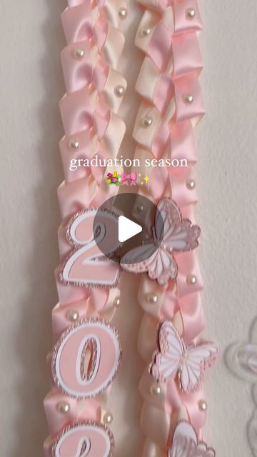 Pink Graduation Lei, Hello Kitty Lei, Coquette Grad Cap, Coquette Graduation Cap, Graduation Ribbon Leis, Graduation Candy Lei, Graduation Vibes, Leis For Graduation, Graduation Lei Ideas