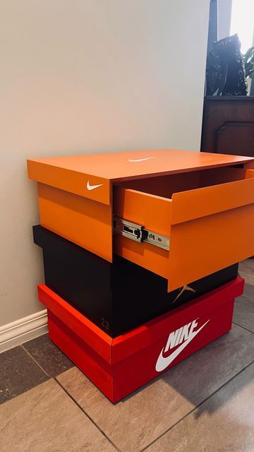 Bespoke Wood Creations on Instagram: "Had fun building and designing this custom Nike bedside cabinet. Featuring three drawers, mitred drawer fronts, and soft close runners. Have had a lot of interest in this cabinet. Thinking about making only a couple more, as one off bespoke pieces. If you wanna have a crack at building one, there will be plans available soon. Have a great Christmas, Cheer Alex #sneakerheads #customfuniture #bespoke #nike #michaeljordan #nikesoccer #woodworker #woodorganizer #solfclose #mitreddrawerfronts #shoestyle #shoeporn #shoes #shoestorage" Men Shoe Storage Ideas, Sneaker Room Decor, Sneaker Head Room Ideas Boy, Nike Bedroom Ideas, Nike Shoe Box Storage, Nike Decor, Sneakerhead Bedroom, Chest Of Drawers Decor, Nike Shoe Box