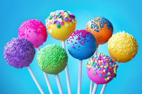 Assortment of brightly colored cake pops. Brightly colored cake pops on a blue background royalty free stock image Chocolate Cake Pops Recipe, Making Cake Pops, Perfect Cake Pops, Store Bought Frosting, Chocolate Cake Pops, Cake Pop Stands, Cake Pops How To Make, Making Cake, Cake Pop Recipe