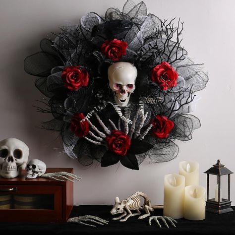 PRICES MAY VARY. Spooky Halloween Garland: Bring the haunted house vibes to life with this stunning garland adorned with red roses, skulls, and spider webs. Versatile Decoration: Perfect for hanging in your spooky haunted house or bar, this garland can also be used as a wreath for Halloween parties and events. Ghostly Design: Featuring eerie black and red roses, creepy skull accents, and dead branches, this artificial wreath will send chills down your spine. Weatherproof Material: Whether used i Head Garland, Cheap Halloween Party, Rosé Halloween, Mesh Garland, Haunted Mansion Halloween, Red Rose Wreath, Halloween Door Wreaths, Spooky Wreath, Halloween Mesh Wreaths