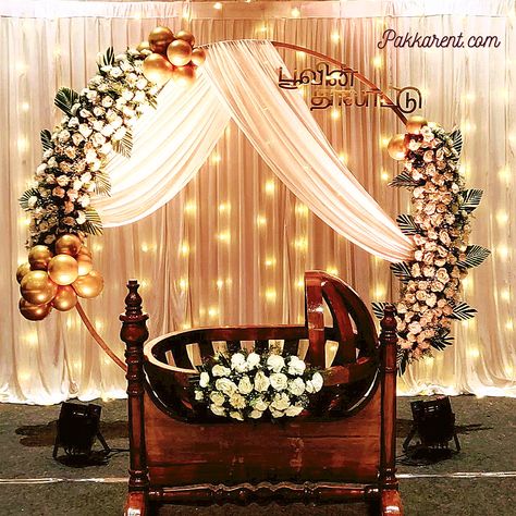 Cradle Decoration With Flowers, Namakarnam Decoration, Baptism Stage Decoration Kerala, Baby Cradle Decoration Ideas, Rice Weaning Ceremony Decoration, Simple Cradle Decoration At Home, Simple Cradle Ceremony Decorations, Cradle Ceremony Decorations Indian, Cradle Decoration For Naming Ceremony