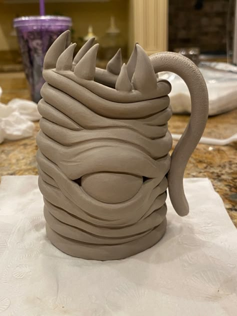 Clay Monster Mug, Coil Mug Ceramics Ideas, Coiling Ceramics Ideas, Coil Cup Pottery, Monster Pottery Ideas, Cute Coil Pot Ideas, Coil Mug Ideas, Ap Ceramics Projects, Coil Sculpture Ideas