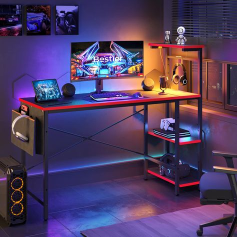 PRICES MAY VARY. More Special: The gaming desk offers a cool LED light, it has 7 color selections and 20 dynamic modes. The LED light creates a fun and exciting atmosphere, you will completely immerse yourself in your work and writing time. The unique gaming table will be the envy of friends and colleagues around you More Design: The home office desks is designed with 4 tier shelf and provide ample storage space for your necessities, such as files, books, and more. Equipped with side storage bag Gaming Desk With Shelves, Pc Gaming Table, Gaming Desk With Storage, Desk With Led Lights, Pc Gaming Desk, Class Board, Mesa Home Office, Printer Shelf, Computer Desk With Shelves