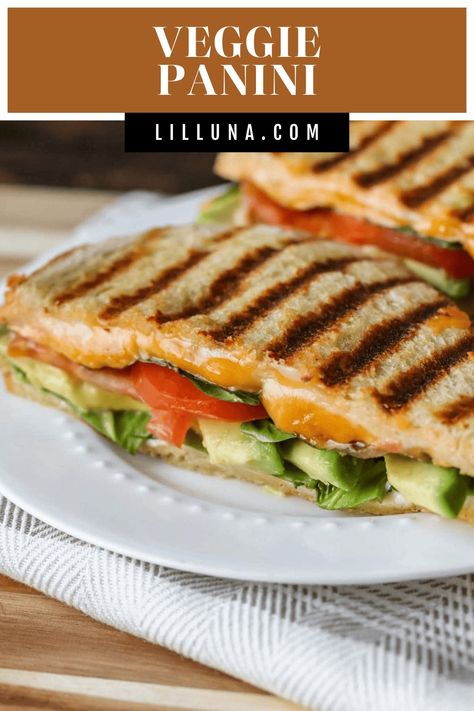 Even without meat, this veggie panini is a delicious hot sandwich filled with cheese, tomato, avocado, spinach and more. #veggiepanini #panini #hotsandwich #veggies #paninis Veggie Panini, Asian Steak Bites, Creamy Pasta Bake, Panini Recipes, Healthy Baked Chicken, Panini Sandwiches, Tomato Avocado, Cheese Tomato, Hot Sandwich