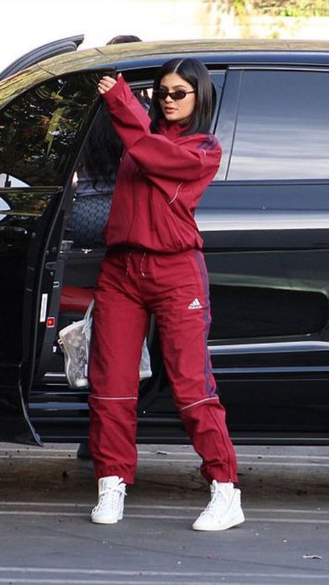 Track suits - These trends are all over social media now, but we'll definitely regret wearing them a few years down the line. Red Tracksuit Outfit Women, Nike Track Suits For Women, Kylie Cars, Adidas Tracksuit Women Outfit, Tracksuit Outfit Women Street Styles, Track Suits Women Style, Red Adidas Tracksuit, Tracksuit Outfit Women, Track Suit Outfit