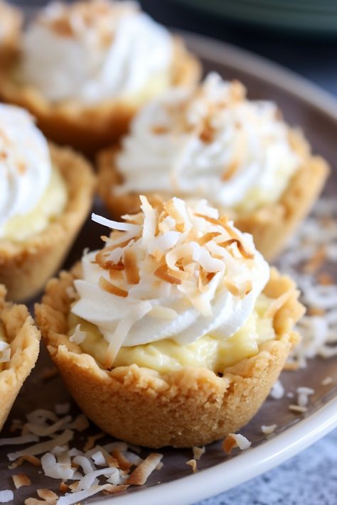 Coconut Cream Pie Cookie Cups Coconut Cream Pie Cookies, Coconut Cream Pie Shooters, Coconut Cream Pie Cookie Cups, Coconut Cream Pie Mini Tarts, Cookies N Cream Dessert Cups, Vanilla Cake Mix Cookies, Filled Cookie Cups, Coconut Cream Filling, Delicious Breakfast Casserole