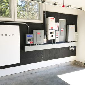 Battery Storage Ideas, Palm Springs Exterior, Stove Hearth, Wood Stove Hearth, Tesla Battery, Tesla Powerwall, Metal House Plans, Solar Tubes, Container Home Designs