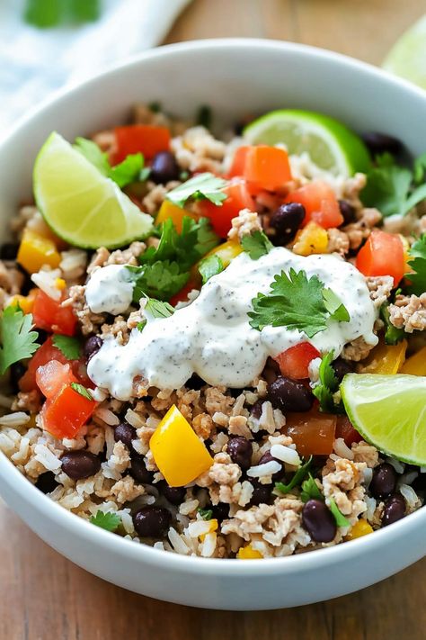 Enjoy a flavorful and satisfying meal with this easy-to-make turkey taco bowl recipe. Packed with delicious ingredients like ground turkey, beans, corn, and avocado, this dish is perfect for a quick weeknight dinner or meal prepping for the week ahead. Customize it with your favorite toppings like salsa, cheese, or sour cream for a tasty twist. Healthy and wholesome, this turkey taco bowl is sure to become a family favorite in no time! Teriyaki Turkey Bowls, Ground Turkey And Corn Recipes, Ground Turkey Bowls Meal Prep, Ground Turkey Mediterranean, Ground Turkey Rice Bowl, Turkey Taco Bowl, Turkey Bowls, Turkey Mediterranean, Mediterranean Bowl