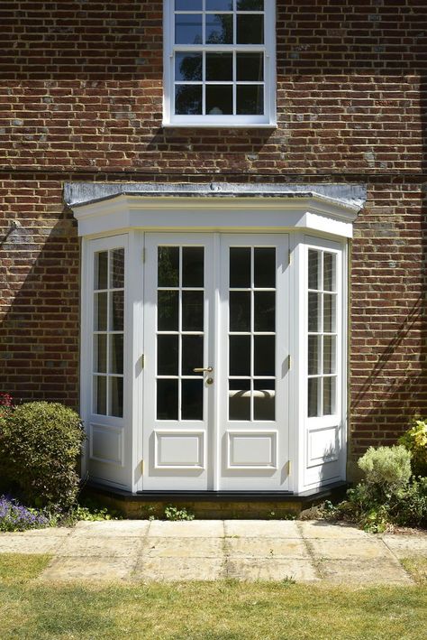 timber french doors designed and approve for listed buildings from timber windows, in traditional white finish with putty glazing and bolection moulding. French Doors Patio Exterior, Profile Handle, Bay Door, House Fence Design, French Doors Exterior, Glass Extension, Glass French Doors, Timber Windows, French Doors Patio