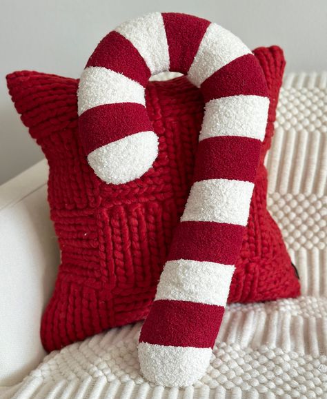 THE ESTIMATED STARTING SHIP DATE IS 10/10/24. Please note PREORDERS take multiple business days to ship due to the high volume. You will receive tracking when your Order ships! Indulge in the sweetness of the season with our Candy Cane Sherpa Pillows! Immerse yourself in the holiday spirit with these delightful and cozy additions to your home decor. Crafted with plush Sherpa fabric, our pillows offer a perfect blend of comfort and style, making them a must-have for festive lounging. The classic candy cane pattern adds a touch of whimsy, bringing the joy of the holidays into any room. Embrace the warmth, softness, and charm of our Candy Cane Sherpa Pillows - the perfect companions for a cozy winter evening. Sprinkle some holiday magic in your home with these irresistible treats! Dimensions: Sherpa Pillows, Candy Cane Pillow, Sherpa Pillow, Candy Cane Pattern, Holiday Pillow, Seasonal Candles, Classic Candy, Pillow Christmas, Candle Wall Decor