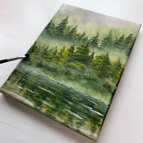 How to paint mist / foggy forest for beginners with acrylic. Check out this green forest painting tutorial Earthy Acrylic Paintings, Forest Rock Painting, How To Paint Mist With Acrylic, Forest Lake Painting, Green Forest Painting, Painting Ideas Forest, Pine Forest Painting, Forest Painting Acrylic, Painting Ideas On Canvas Green