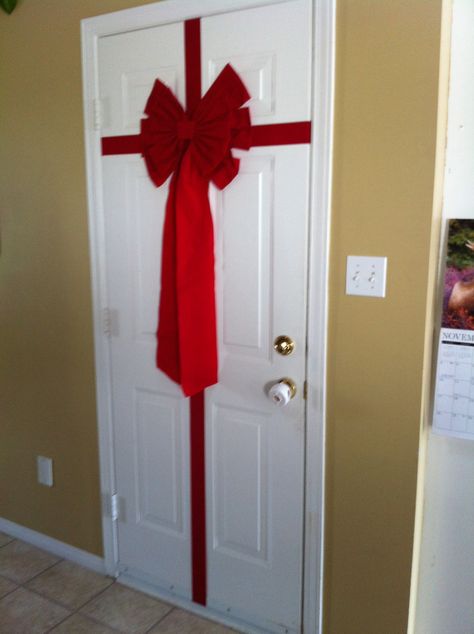 Dollar store ribbon & bow turns a door into a cheap present(decoration) ;) Gift Wrapped Door Christmas, Ribbon On Door, Christmas Wishes For Friends, Cheap Presents, Christmas Classroom Door, Homemade Christmas Decorations, Open Me, Wishes For Friends, Christmas Decorations Diy Outdoor