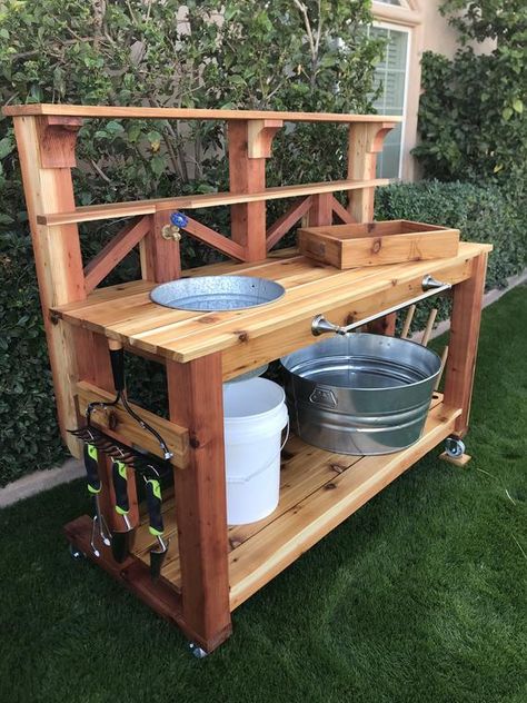 FREE DELIVERY! TO ALL LOWER 48 STATES NO ASSEMBLY REQUIRED! This beautiful potting bench is made from quality 7/8” western red cedar and large timber redwood that naturally resists weather, insects and decay. This potting bench is sturdy enough to last for years. It’s perfect for all gardeners to Potting Bench With Sink, Garden Work Bench, Potting Bench Ideas, Potting Bench Plans, Potting Station, Outdoor Potting Bench, Garden Sink, Outdoor Garden Bench, نباتات منزلية