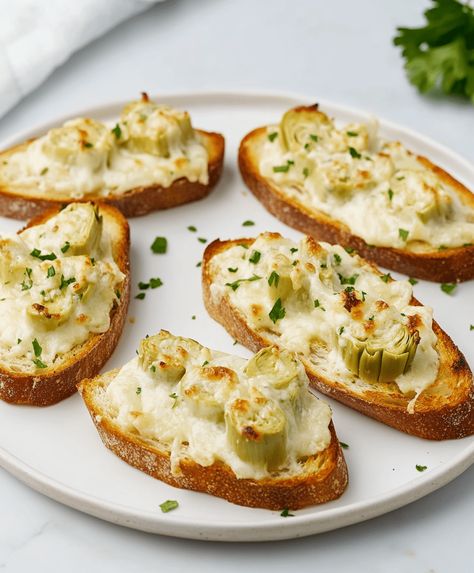 Artichoke Bruschetta Recipe Spinach Artichoke Bruschetta, Artichoke Crostini Appetizers, Artichoke Bruschetta Recipes, Easy Pepper Jelly, Artichoke Crostini, Pepper Jelly Cheese Dip, Spicy Pepper Jelly, Artichoke Bruschetta, Artichoke Appetizer