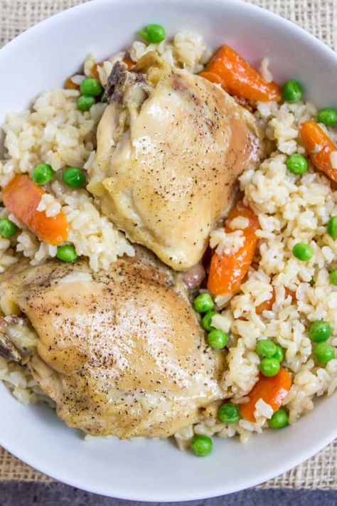 One Pan Baked Chicken Brown Rice Vegetable Casserole, served with Carrots and Peas, is healthy, flavorful and involves almost no clean-up! Chicken Rice And Peas, Chicken Breast Crockpot Recipes, Vegetable Casserole Recipes, Chicken Shawarma Recipe, Crockpot Chicken Breast, Seared Chicken Breast, Chicken And Brown Rice, Rice Casserole Recipes, Brown Rice Recipes