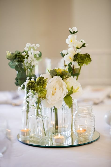 Bulb Vases Wedding Centerpieces, Frameless Candle Centerpiece, Centerpieces Wedding Mirror, Round Mirror Centerpiece Wedding, Vase And Candle Centerpieces, Mirrored Centerpieces Wedding, Bud Vases On Circle Table, Flower Centrepiece For Round Table, Simple Round Table Centerpieces