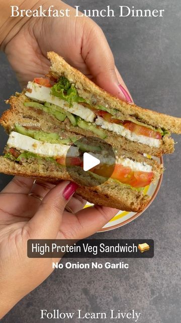 Arti Sahani | Learn Lively on Instagram: "HIGH PROTEIN VEG SANDWICH🥪 No Onion No Garlic Loaded with flavours & nutrients !!  Ingredients - 1/4 cup Boiled chickpeas  4 soaked almonds  Green chilli Mint leaves  Coriander leaves  Water Salt to taste Roasted cumin powder  50g fresh paneer 1/4 tsp Olive oil Sesame seeds Oregano  Chilli flakes Lettuce  Tomato Cucumber  Whole wheat bread  Follow @learnlively for more  No Repost Allowed!  #explorepage #sandwichporn #proteinfood #mealprep #cravings #instagood #simpleeats #trending #healthy #food #exploremore #explorefood #highprotein #viralreels #sandwich #weightlossfood #healthysandwich #weightloss #simplefood #eathealthy #vegetarian #recipealert #homemadefood #healthyfood #healthyrecipes #foodideas #healthyfoodideas #healthyfoodporn #healthyfood No Garlic No Onion Recipes, Healthy Tiffin Recipes, Bread Snacks Recipe, Indian Bread Recipes, Sandwich Recipes Indian, Paneer Sandwich, Vegetarian Sandwich Recipes, Veg Sandwich, Soaked Almonds