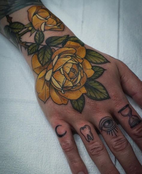 Yellow Rose Tattoo, Yellow Tattoo, Yellow Rose Tattoos, Rose Hand Tattoo, Skeleton Hand Tattoo, Leg Sleeves, Hand Tattoo, Orange Roses, Rose Tattoo