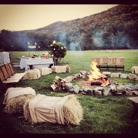 Fire pit and s'more bar Fall Wedding Fire Pit, Fire Pit Wedding Reception, Wedding Smores Bar Fire Pits, Wedding Pig Roast, Pig Roast Wedding Reception, S’more Table, Bonfire Wedding Reception, Fire Pit Wedding, Wedding Fire Pit