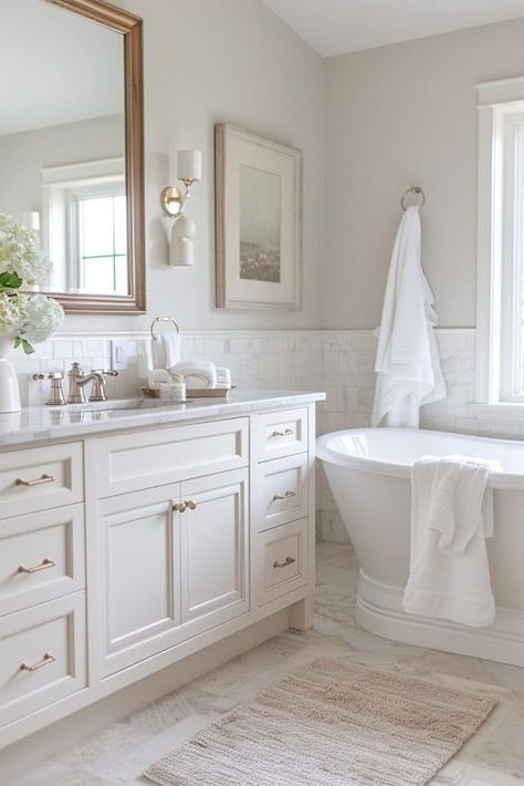 Off White Cabinets Bathroom, Wallpaper Bathroom White Tile, Master Bath Inspiration White Cabinets, Clean White Bathroom Aesthetic, Most Pinned Bathrooms, White Aesthetic Bathroom Ideas, Southern Master Bath, Bathrooms With Silver Fixtures, Neutral Gold Bathroom