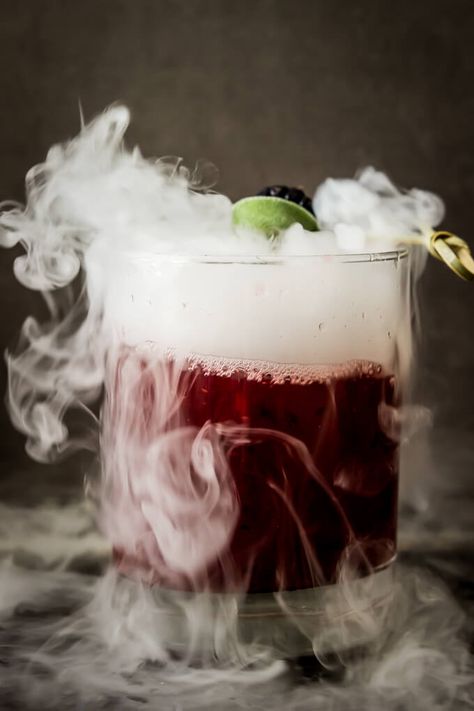 Our collection of Halloween drinks, featuring spooky drinks and serving tips to make them look scary! Lots of great cocktail recipes here. Sage Margarita, Dry Ice, Halloween Cocktails, Blackberry, Halloween, Glass, Green