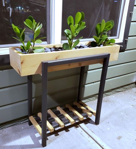 "Introducing our Modern-Style Wooden Planter - a perfect blend of style, functionality, and eco-friendly design. Expertly crafted from sustainably sourced Cypress, this planter adds a touch of modern elegance to any indoor or outdoor space. Its clean lines and natural finish highlight the beauty of its wood grain, offering a minimalist aesthetic that complements any home decor, from contemporary to rustic. At dimensions of 30\"L X 10\"W X 30 H it provides ample space for your favorite plants, while ensuring they have the room they need to thrive. This planter has been carefully treated to resist the elements, ensuring that it will continue to hold its beauty through every season.  Whether you're looking to bring a touch of green to your living room, balcony, or garden, our Modern-Style woo Garden Decorations Ideas, Colourful Garden, Planter Project, Wooden Planter, Metal Plant Stand, Diy Wooden Projects, Living Room Balcony, Room Balcony, Outdoor Diy Projects