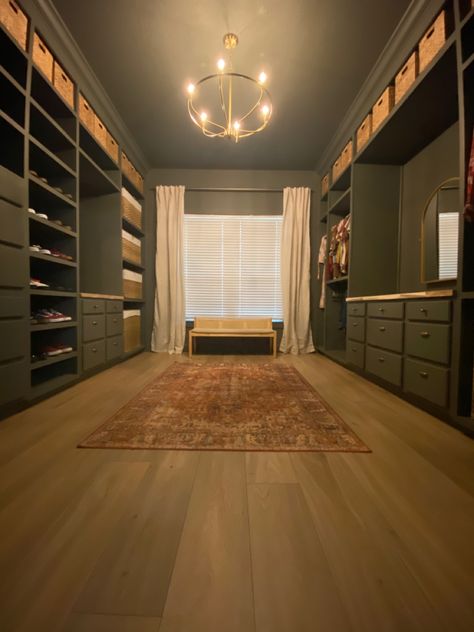 Moody Closet Renovation. Paint: Cast Iron by Sherwin Williams. Accents: Natural wood tones & gold. Moody Master Closet, Barndominium Closet Ideas, Barndominium Master Closet, Moody Ranch House, Moody Walk In Closet, Cast Iron Sherwin Williams, Closer Idea, Moody Closet, Spare Room Walk In Closet