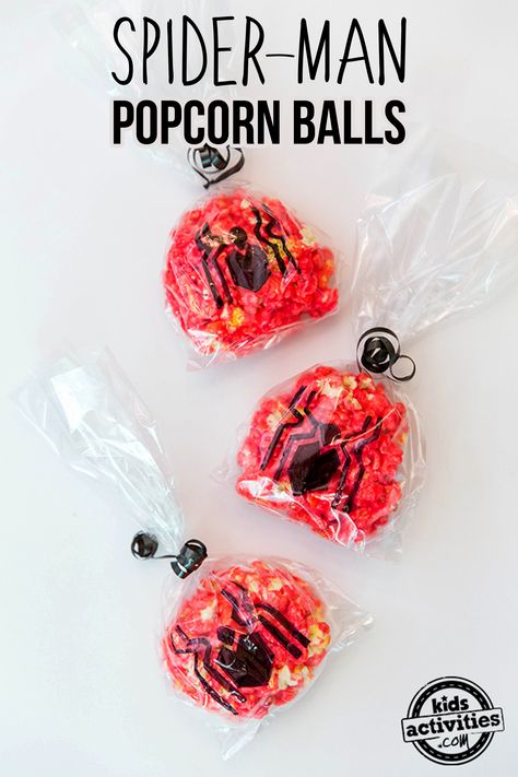 A fun Spider-Man themed treat that is perfect for a movie night or birthday party! Strawberry Popcorn, Popcorn Balls Recipe, How To Make Popcorn, Perfect Movie Night, Halloween Popcorn, Popcorn Treats, Popcorn Balls, Movie Night Snacks, Butter Popcorn