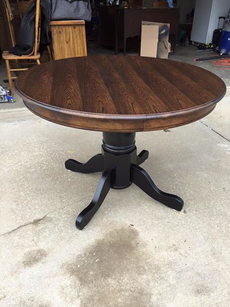 Stained Round Kitchen Table, Stained Table With Black Chairs, Table With Stained Top And Painted Base, Wood Table Black Base, Circle Kitchen Table Black, Diy Black Table Makeover, Dark Stained Dining Table, Black And Cherry Dining Table, Black And Stained Table