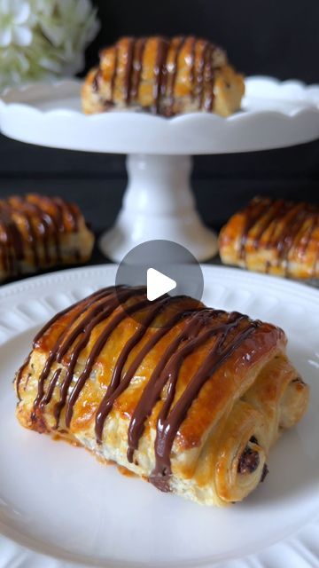 Food with Style 🤍 on Instagram: "Ad  Pain au Chocolat Recipe 🤍  These delicious French pastries are perfect for any occasion and are sure to delight at every coffee gathering. 🥰  📝 Ingredients:  - 1 roll of puff pastry - Chocolate chips - 1 egg yolk - 1 tbsp milk - Maple syrup - Chocolate couverture  🤍 Instructions:  1. Preheat the oven to 190°C and line a baking sheet with parchment paper.  2. Cut the puff pastry into long strips about 8-10 cm wide. Depending on the size of the puff pastry, you should get about five strips.  3. Evenly distribute a handful of chocolate chips along the center of each strip.  4. Roll the dough from both sides towards the center, creating two rolls that meet in the middle. Turn the rolled dough over so the two rolls face downward.  5. Whisk the egg yolk Coffee Gathering, Pain Au Chocolat Recipe, Puff Pastry Chocolate, Crossant Recipes, French Pastries Recipes, Pastry Chocolate, Puff Pastry Desserts, Puff Pastry Tart, Puff Pastry Dough