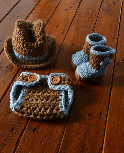 If you are looking for a baby cowboy outfit, you will love the crocheted boots, hat and diaper cover. This cute baby cowboy outfit is the perfect outfit for your baby photos. This baby cowboy outfit is made from acrylic yarn in brown and blue colors. To reduce the cost of shipping for my buyers Crochet Cowboy Boots, Newborn Cowboy, Baby Cowboy Hat, Cowboy Baby Clothes, Baby Boy Cowboy, Fuchs Baby, Baby Cowboy Boots, Crochet Baby Photo Prop, Cowboy Outfit