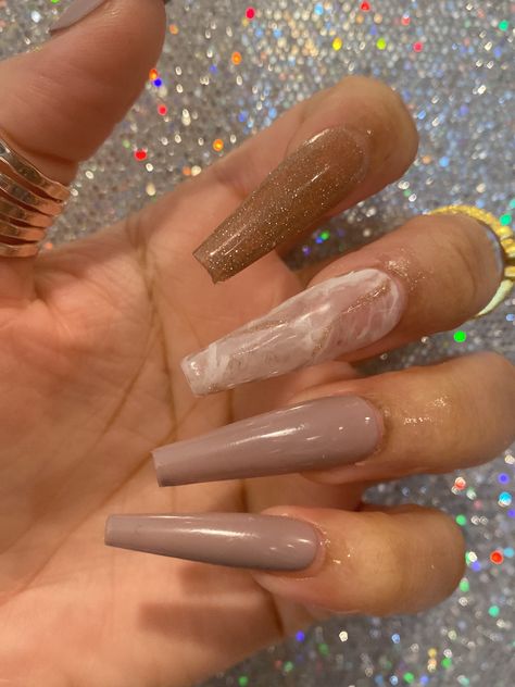 Taupe with marble and reflective glitter.