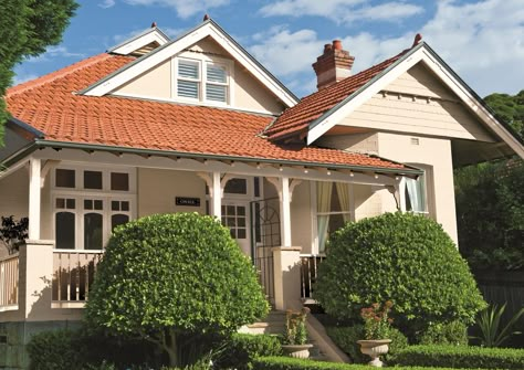 Work with the natural colours and textures of your home to create a colour scheme, like the natural terracotta roof of this house. #taubmanscolour #exterior #naturalmaterials #cafe #teague Terracotta Roof Colour Scheme, Terracotta Roof House, American Bungalow, Red Roof House, Terracotta Roof Tiles, Exterior House Renovation, Terracotta Roof, House Colours, California Bungalow