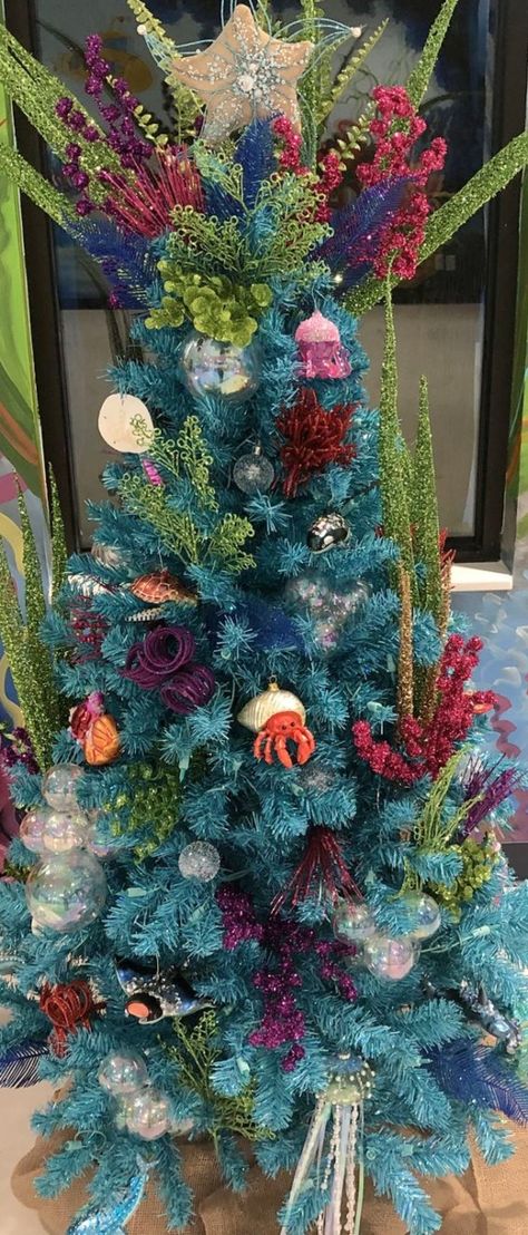 10 Under the Sea Ocean Christmas Tree Ideas Mermaid Christmas Tree Ideas, Little Mermaid Christmas Tree, Ocean Themed Christmas Tree, Under The Sea Christmas Tree, Under The Sea Ideas, Under The Sea Christmas, Mermaid Christmas Tree, Ocean Christmas, Ocean Stuff