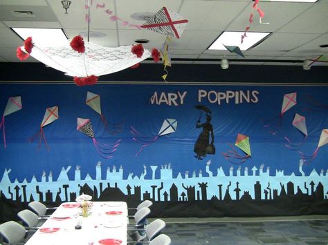 For our Mary Poppins' Tea Party, the Children's department dressed up the Garfield room with kites and parasols hanging from the ceiling and the London skyline with Mary Poppins flying over the buildings. Garfield Room, Mary Poppins Party Decorations, Merry Poppins, Mary Poppins Silhouette, Mary Poppins Musical, School Finds, Mary Poppins Party, Disney Themed Classroom, Pto Ideas