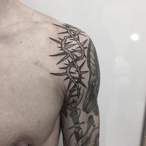 Crown of thorns tattoo on the left shoulder Tattoo Thorns, Crown Of Thorns Tattoo, Crown Thorns, Thigh Band Tattoo, Thorns Tattoo, Thorn Crown, Thorn Tattoo, Wrist Bracelet Tattoo, Left Arm Tattoos