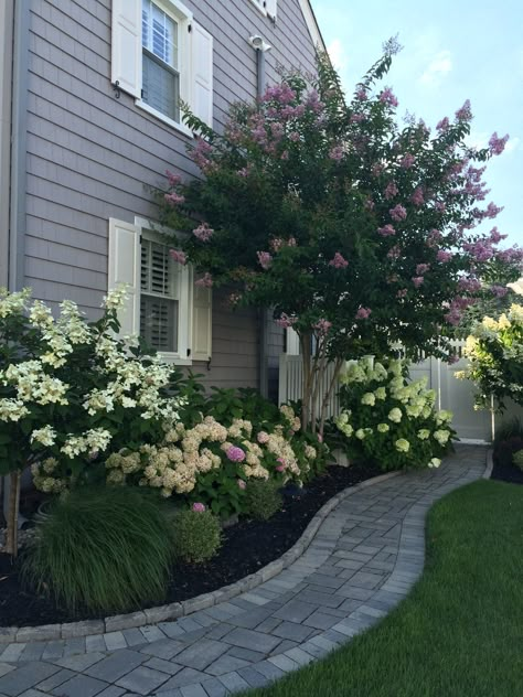 Shady Side Of House Landscaping, Beige House Landscaping, House Corner Landscaping, Row House Front Yard Landscaping, Backyard Landscaping Against The House, Landscaping Side Of Garage, Climbing Plants Front Of House, Landscape In Front Of Bay Window, Side Entry Garage Landscaping