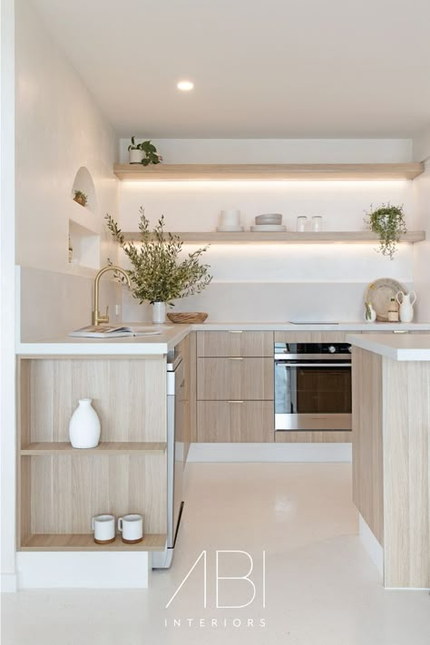 The kitchen in @luca_onthebeach⁠ is a standout feature of the Airbnb property.⁠ ⁠ Layers of shelving transform practicality into an art form, while our brushed brass Elysian Kitchen Mixer and Rappana Cabinetry Pulls enrich each functional experience with their minimalistic designs. ⁠ ⁠ What's your favourite part of Luca on the Beach?⁠ Brushed Brass Tapware, Brass Tapware, Amazing Restaurants, Abi Interiors, Kabinet Dapur, 아파트 인테리어, Coastal Kitchen, Kitchen Room Design, Kitchen Inspiration Design