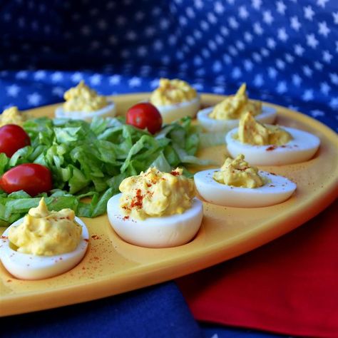 Creamy Cajun Deviled Eggs New Orleans Appetizers, Cajun Deviled Eggs Recipe, Delived Eggs, Cajun Deviled Eggs, Spicy Deviled Eggs Recipe, Cajun Appetizers, Pickle Salad, New Orleans Theme, Colored Deviled Eggs