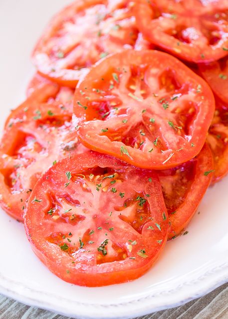 Greek Marinated Tomatoes - only 2 ingredients! Great way to use up all those yummy ripe tomatoes. Great as a side dish or on a sandwich! These make THE BEST BLT sandwich EVER! Whip up a batch today! Such an easy side dish recipe. Summer Tomato Recipe, Southern Tomato Pie, Greek Dressing, Marinated Tomatoes, Tomato Pie, Food Homemade, Summer Tomato, Side Dish Recipes Easy, Watermelon Salad