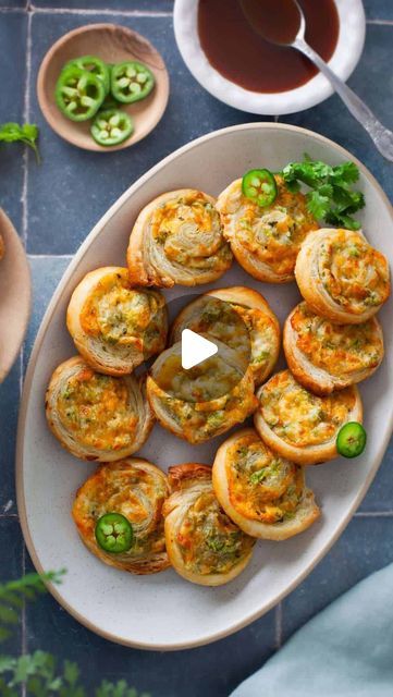 Tanvi @ sinfullyspicy.com on Instagram: "Cheesy Puff Pastry Jalapeño Pinwheels. Imagine buttery folds of crisp puff pastry bursting with a cheesy spicy filling! These cheesy jalapeno pinwheels are appetizer dream come true, especially if you love yours with a kick!

Studded with diced jalapeños cream cheese filling to which I added a touch of garam masala, garlic powder and black pepper, these fly off the plate within minutes! 

I have made them so many times throughout this year and they are always a hit. Comment "recipe" and I will DM you the direct link. 
.
.
#sinfullyspicy #jalapeno #pinwheels #puffpastry #appetizers #Indianfoodbloggers #diwalisnacks" Jalapeño Pinwheels, Jalapeno Pinwheels, Cheesy Puffs, Cheesy Puff Pastry, Diwali Snacks, Cheese Pinwheels, Savory Pie, Cream Cheese Filling, Garam Masala